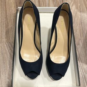 Slightly used heels, they are a really dark blue